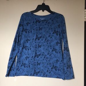 A set of two really cute long sleeve shirts